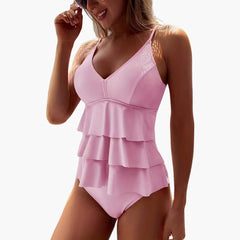 Einteiliger Damen-Badeanzug mit V-Ausschnitt und mehrlagigen Rüschen. in Leuchtend rosa