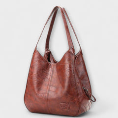 Reniva – Vintage-Schultertasche mit klarer Linie in Weinrot