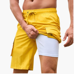 Herren Badeshorts mit Stretchstoff und Seitentasche in Gelb