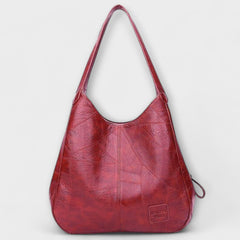 Reniva – Vintage-Schultertasche mit klarer Linie in Rot