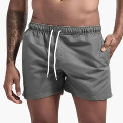 Schnelltrocknende Badehose - für Herren mit sportlichem Look in Grau