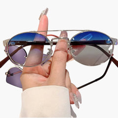 Damen Sonnenbrille mit ovalen Gläsern und UV-Schutz in Blauer Tee