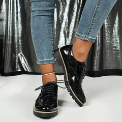 Ninette – Glänzende Lederschuhe in Schwarz