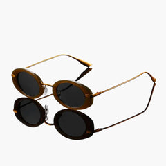 Damen Sonnenbrille mit runden Gläsern und UV-Schutz in Graugold