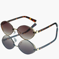 Damen Sonnenbrille mit ovalem Metallrahmen und UV400-Schutz in Goldtee