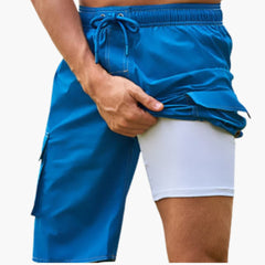 Herren Badeshorts mit Stretchstoff und Seitentasche in Pfauenblau