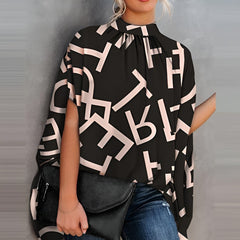 Alicia - Einmalige und elegante Bluse in Schwarzer Buchstabe