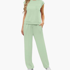 Zweiteiliges Sommer Set für Damen mit Kappärmeln und Taschen in Hellgrün