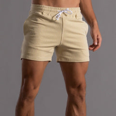 Superstretchige Trainingsshorts für Herren in Gelb