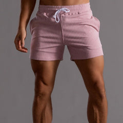 Superstretchige Trainingsshorts für Herren in Rosa