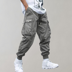Herren Cargo Jogginghose – Lila Streetwear-Hose mit Reißverschlusstaschen & Bündchen in Grau