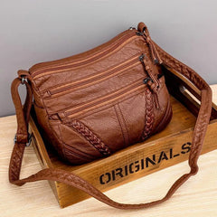 Elegante Damenhandtasche aus funktionalem, weichem Material in Braun