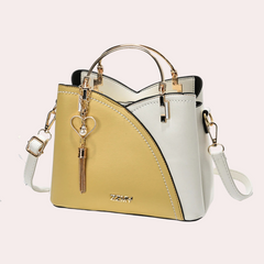 Elegante Damenhandtasche aus stilvollem veganem Leder in Gelb