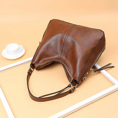 Romy | Elegante Ledertasche in Braun