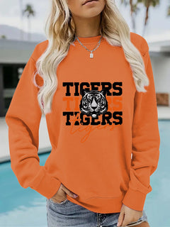 Damen Sweatshirt mit animalistischem Tiger-Design und lässigem Schnitt in Orange