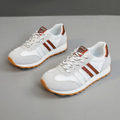 Damen sportliche Sneakers mit atmungsaktivem Obermaterial und dämpfender Sohle in Grau