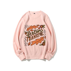 Damen Sweatshirt mit buntem Herbstmotiv und inspirierendem Schriftzug in Rosa