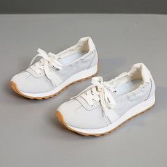 Damen Leichte und flexible Freizeitsneaker mit elastischer Einfassung in Grau
