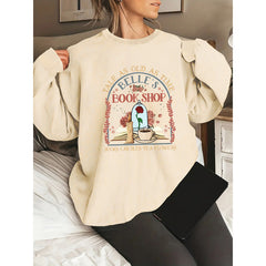 Damen Sweatshirt mit einzigartigem Buchladen-Motiv in Aprikose