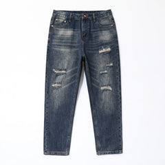 Sandro | Relaxed Fit Tapered Jeans in Blau mit Rissen