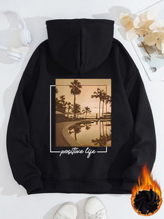 Damen Kapuzenpullover mit urbanem Palmenmotiv und positivem Schriftzug in Schwarz