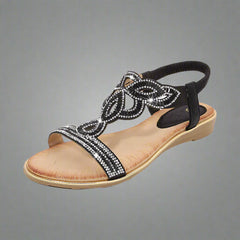 Wally | Handgefertigte goldene Sandale mit bequemer Passform in Schwarz