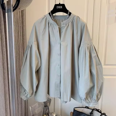 Quarisa – Übergroße Vintage-Bluse mit Puffärmeln