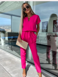 Kurzarm-Jumpsuit mit Gürtel für Damen in Dunkel rosa