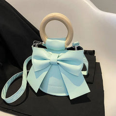 Gretta - Handtasche mit Fliege - Runder Holzgriff in Blau