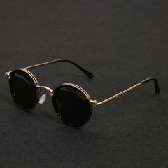 Mette | Zeitlose Runde Sonnenbrille in Gold / Schwarz