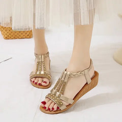 Thea® | Elegante Sandalen mit piepender Spitze in Gold