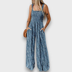 Seraphie – Floraler Jumpsuit in Blau