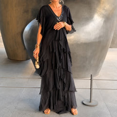 Riza - Elegant geschnittenes Plisseekleid in Schwarz