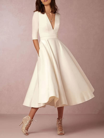 Erykah - Elegantes Retro-Kleid mit V-Ausschnitt