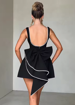 Damen Ärmelloses Minikleid mit Perlenbesatz und Rückenschleife in Schwarz