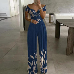 Damen Jumpsuit mit Off-Shoulder-Ausschnitt und Wickeloberteil mit weitem Bein in Blau mit Blätterdruck