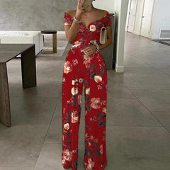 Damen Jumpsuit mit Off-Shoulder-Ausschnitt und Wickeloberteil mit weitem Bein in Rot mit Blumendruck