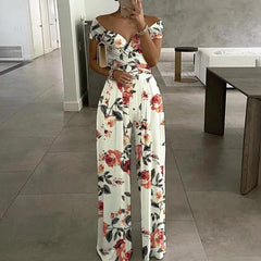 Damen Jumpsuit mit Off-Shoulder-Ausschnitt und Wickeloberteil mit weitem Bein in Weiß mit Blumendruck