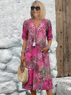 Lina | Lebendiges Midikleid mit modernem Stil in Rosa