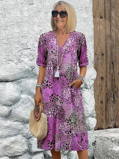 Lina | Lebendiges Midikleid mit modernem Stil in Lila