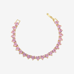 TENNISARMBAND MIT ROSÉ-HERZ in Gold