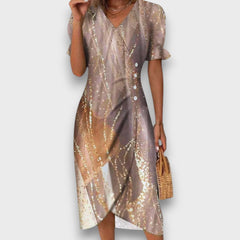 Heliane – Blumiges Midikleid in Gold