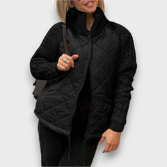 Ravinne – Steppjacke mit Strickärmeln in Schwarz