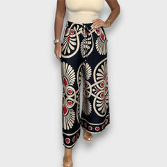 Rania – Fließende Hose mit Print in Schwarz