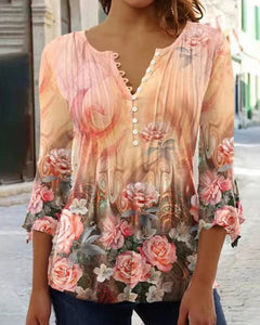 Karoline | Blumige Bluse mit V-Ausschnitt in Orange