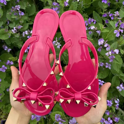 Nikki® | Flip-Flops-Sandalen mit Schleife und Nieten